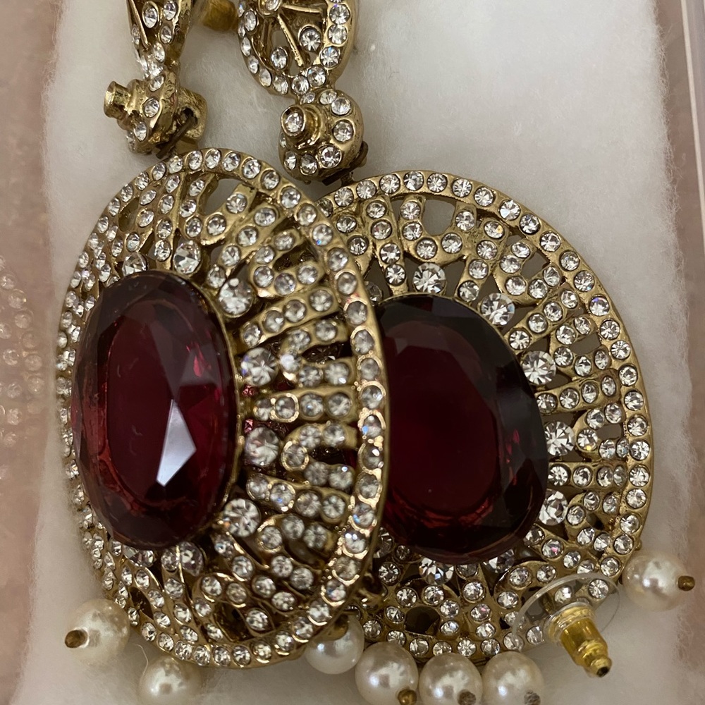 Purple statement earrings